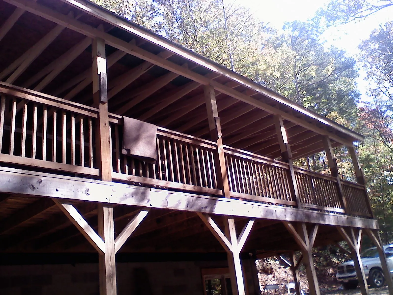 Timber framing under a new elevated porch and deck — Roof Leak Repair in Rock Island by Roofing Brothers
